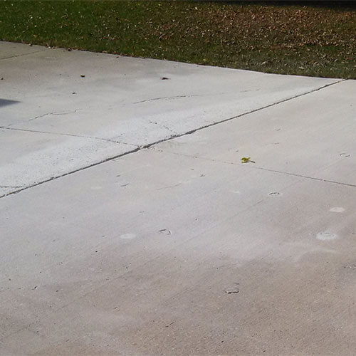 Concrete driveway after PolyLevel in Rochester, MN
