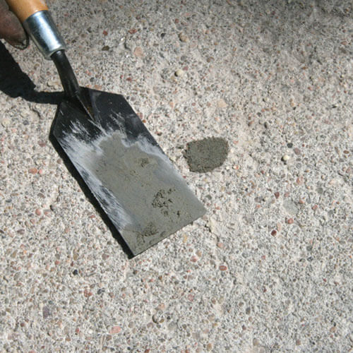 PolyLevel step 4: sealing holes and control joints in Fargo, ND