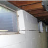 A foundation showing severe inward buckling along the windows in a Inver Grove Heights home.