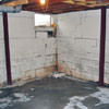 Rusted, corroded i-beams found with a failing foundation in a Newport home.