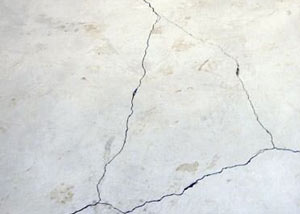cracks in a slab floor consistent with slab heave in Minot, ND.