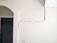 Drywall cracking due to foundation settlement in Moorhead