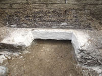 Preparing a foundation footing for helical pier installation in St. Cloud