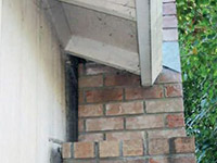 A chimney leaning away from the home on a Mankato foundation