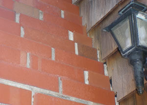 a repaired chimney in Minnetonka that had shown serious foundation damage and was repaired with a helical pier system.