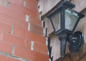 A tilting chimney in Minnetonka showing serious foundation damage.