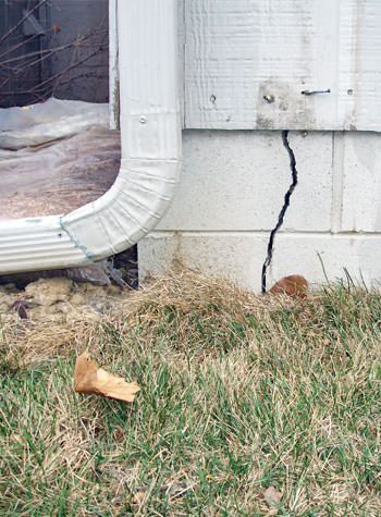 foundation wall cracks due to street creep in Fergus Falls