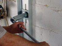Mounting a foundation wall channel anchor in Maple Grove.