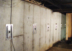A foundation wall in Alexandria repaired with foundation wall anchors.
