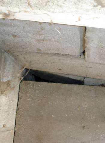 inward rotation of a foundation wall damaged by street creep in a garage in Shakopee