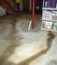 Flooding entering a basement through a floor crack in Newport