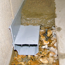 The WaterGuard® basement drain system installed in a Minneapolis, MN basement.