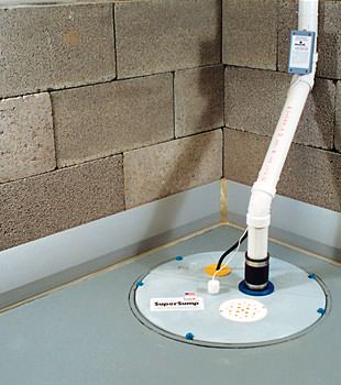 A baseboard basement drain pipe system installed in Grand Forks