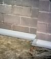 Our baseboard drain system installed on a corner in a Eden Prairie basement.