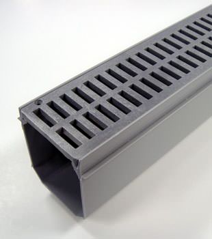A closeup of our grated basement drainage pipe system, installed in Minot, ND