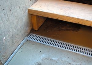 a hatchway entrance in Newport that has been protected from flooding by our TrenchDrain basement drainage system.