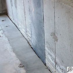 an ugly basement weeping tile drainage system that's clogged and not working in Bismarck.