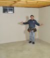 Maple Grove basement insulation covered by EverLast™ wall paneling, with SilverGlo™ insulation underneath